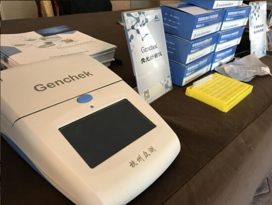 ZC Bioscience booth with Genchek analyzer and reagent kits